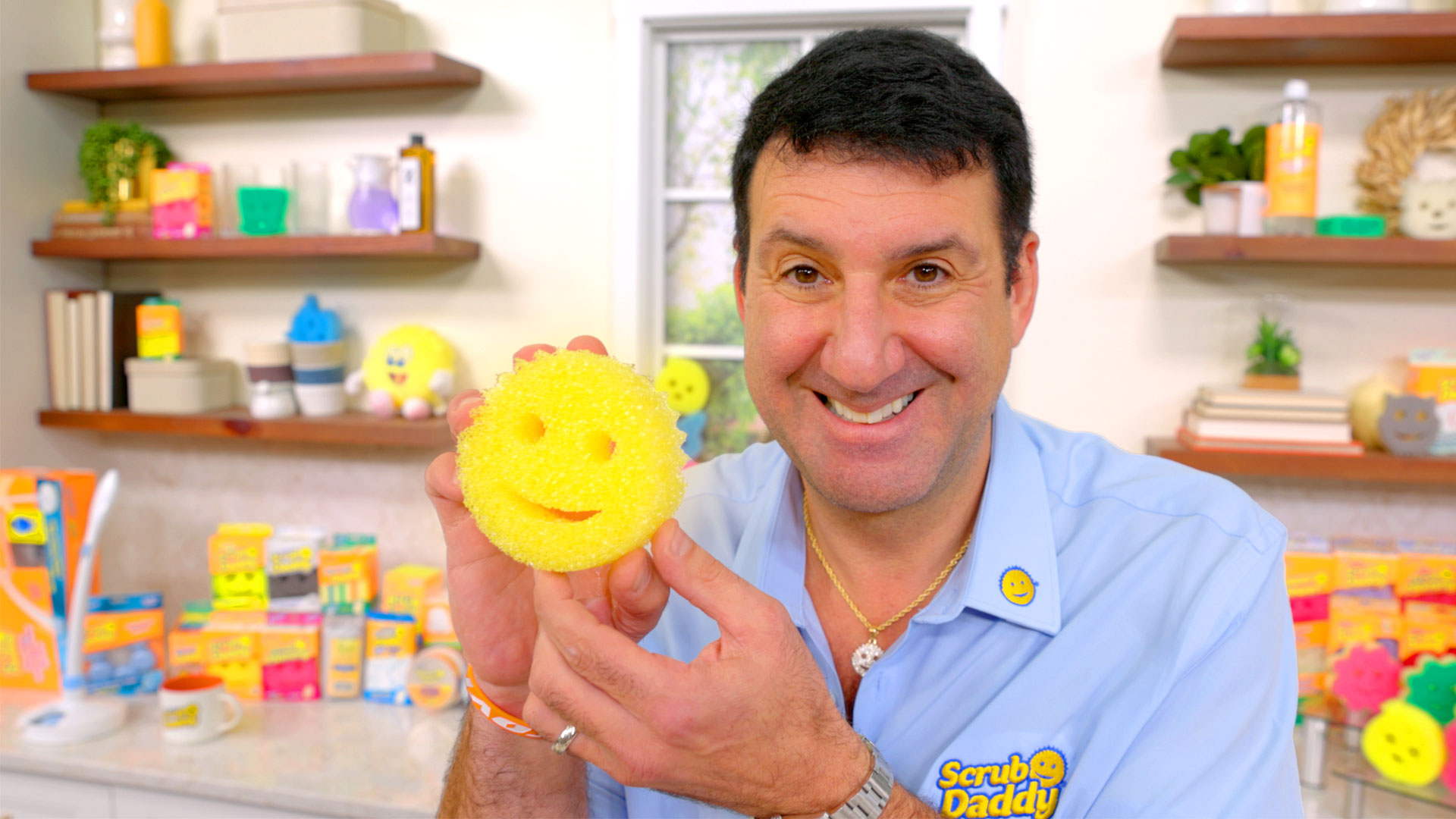Scrub Daddy Sponge holding by the founder